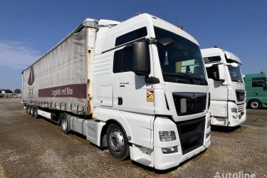 MAN TGX LL 18.440 nyergesvontató + függönyponyvás félpótkocsi